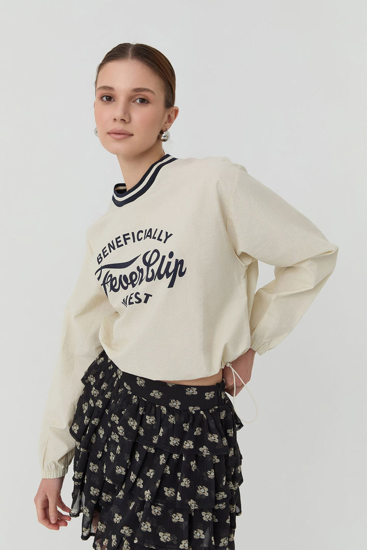 23351Printed Long Sleeve Blouse with Elastic Waist Light Stone