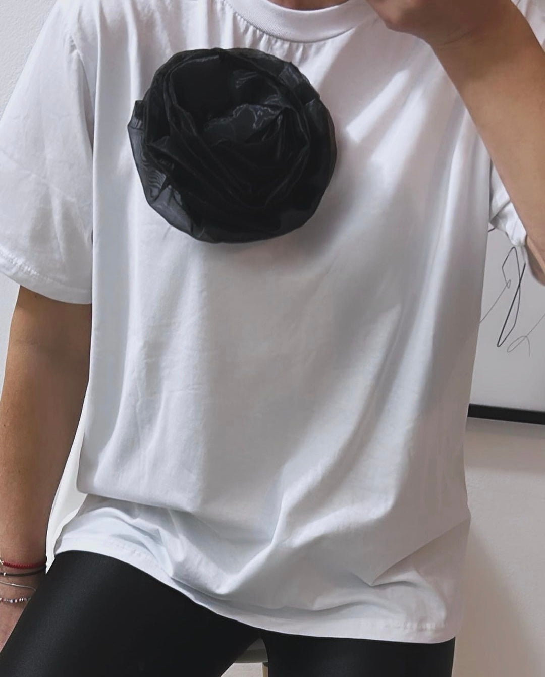White half sleeve shirt with black rose brooch
